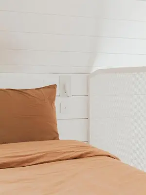 Un ou plusieurs lits dans un hébergement de l'établissement Tikalon - Tiny House en bord de mer