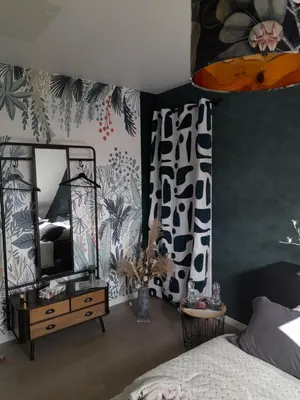 Un ou plusieurs lits dans un hébergement de l'établissement CHAMBRE DANS UN ECRIN DE VERDURE