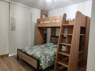 Un ou plusieurs lits dans un hébergement de l'établissement Studio privée de 24m2 à 20 min de Puy du fou
