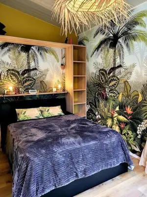 Un ou plusieurs lits dans un hébergement de l'établissement Copacabana TINY HOUSE studio terrasse jardin