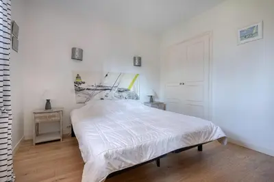 Un ou plusieurs lits dans un hébergement de l'établissement Villa avec jacuzzi - 15 pers. à 350m de la plage