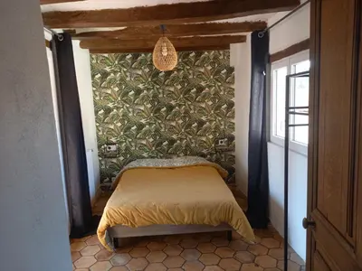 Un ou plusieurs lits dans un hébergement de l'établissement Appartement, meublé tourisme, Gîte la Maillée