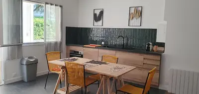 Cuisine ou kitchenette dans l'établissement Le Riadh
