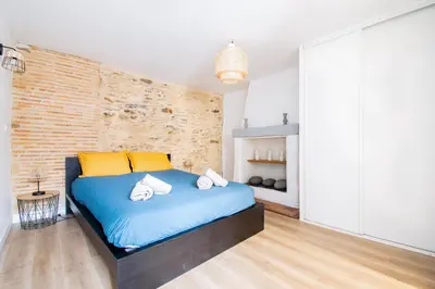 Un ou plusieurs lits dans un hébergement de l'établissement T3 Duplex de charme au cœur du quartier historique