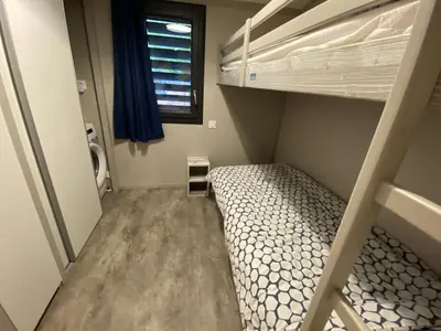 Un ou plusieurs lits dans un hébergement de l'établissement Chalet pour 5 - Piscine couverte - St Hilaire