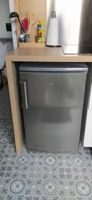 Cuisine ou kitchenette dans l'établissement Studio indépendant au calme
