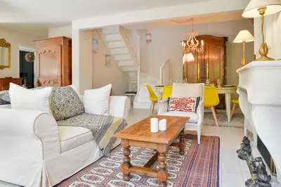 Coin salon dans l'établissement Magnolia - Charmante maison avec jardin