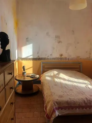 Un ou plusieurs lits dans un hébergement de l'établissement Chambres d'Hôtes - Ancienne Ecole St Joseph