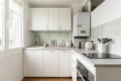 Cuisine ou kitchenette dans l'établissement Joli Appartement avec Garage sur l'Île de Nantes