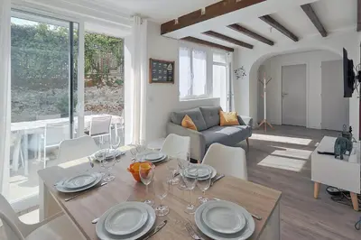 Coin salon dans l'établissement Logement récent 3 chambres à 200m mer et commerces