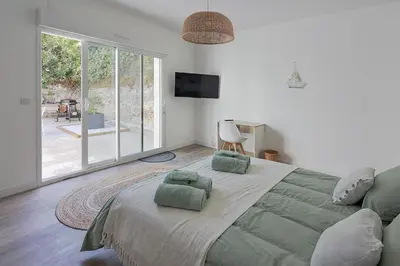 Un ou plusieurs lits dans un hébergement de l'établissement Logement récent 3 chambres à 200m mer et commerces