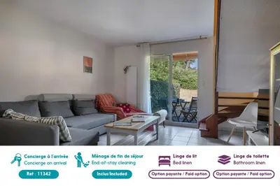 Coin salon dans l'établissement Maison à 500m de la plage pour 4