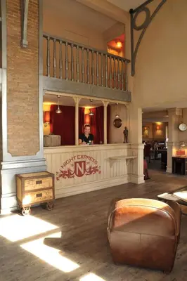 Coin salon dans l'établissement Brit Hotel Essentiel Cholet