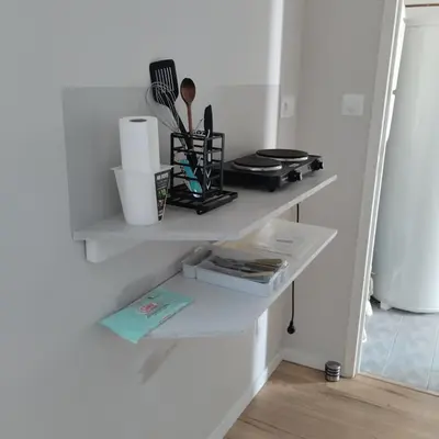Cuisine ou kitchenette dans l'établissement Studio attenant a la maison principale