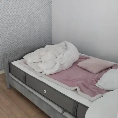 Un ou plusieurs lits dans un hébergement de l'établissement Studio attenant a la maison principale