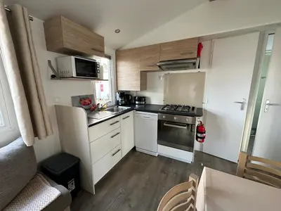Cuisine ou kitchenette dans l'établissement Les sables chal’heureux