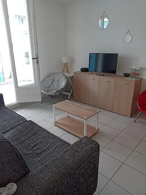 Télévision ou salle de divertissement dans l'établissement APPARTEMENT BORD DE MER