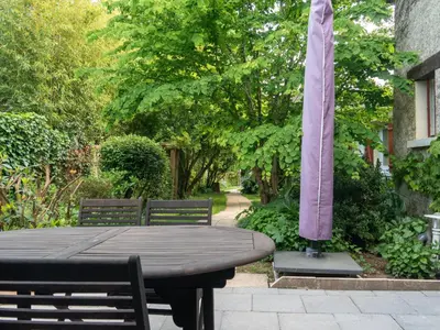Jardin de l'établissement Confort et Tranquillité à Blain : Chambre Climatisée, Salle d'Eau Privative, Wifi et Vélos à Disposition - FR-1-306-1253
