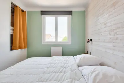 Un ou plusieurs lits dans un hébergement de l'établissement Ambiance paisible sur la côte vendéenne