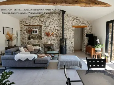 Coin salon dans l'établissement La villa du pressoir, classé 3 étoiles meublé de tourisme