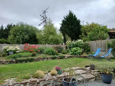Jardin de l'établissement La villa du pressoir, classé 3 étoiles meublé de tourisme