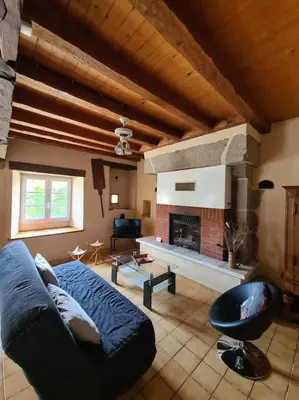 Coin salon dans l'établissement Chez Lili Maison de campagne gîte familial