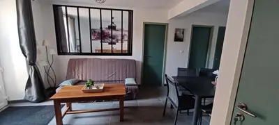 Coin salon dans l'établissement Gîte de la Fecleval 6 personnes proche puy dufou