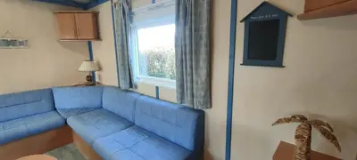 Coin salon dans l'établissement Chalet spacieux à 8 km de la mer