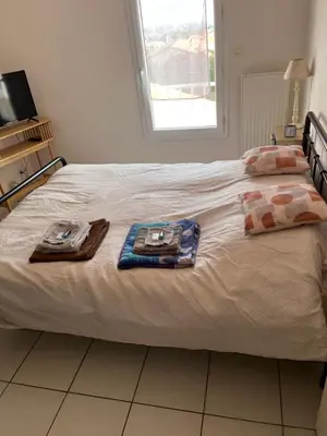 Un ou plusieurs lits dans un hébergement de l'établissement Villa baba