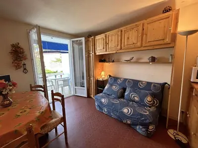 Coin salon dans l'établissement Appartement calme 4 pers proche plage avec terrasse et parking - Saint-Jean-de-Monts - FR-1-224C-259
