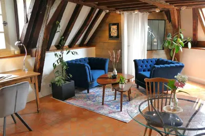 Coin salon dans l'établissement Suite Toussaint - Calme & Authentique