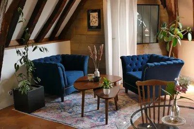 Coin salon dans l'établissement Suite Toussaint - Calme & Authentique