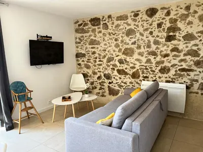 Télévision ou salle de divertissement dans l'établissement Gîte O Petit Bouchon à 10 min du Puy du Fou