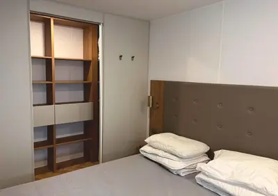 Un ou plusieurs lits dans un hébergement de l'établissement Grand mobile-home 45M2 au calme et au bord de mer