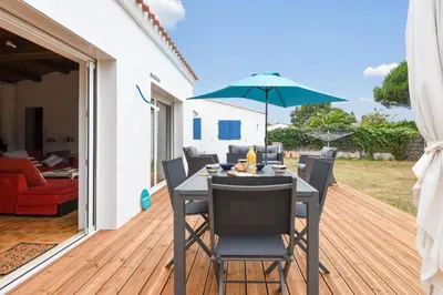 Coin salon dans l'établissement Maison pour 7 - 400 m de la plage de la Clère