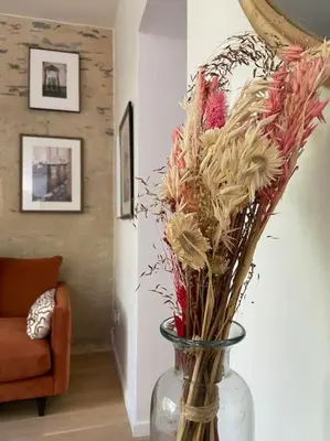 Coin salon dans l'établissement Très bel appartement avec jardin reposant