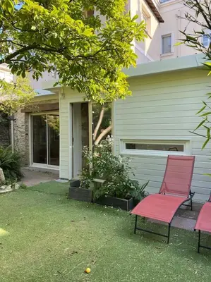 Jardin de l'établissement Très bel appartement avec jardin reposant