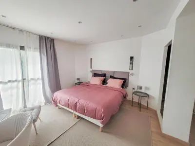 Un ou plusieurs lits dans un hébergement de l'établissement Maison 12 personnes, Vendée et puy du fou