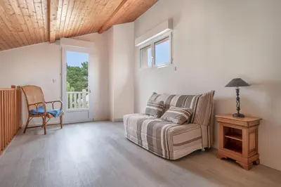 Coin salon dans l'établissement Maison 10p au calme 200m mer