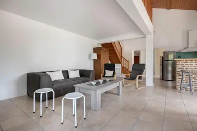 Coin salon dans l'établissement Maison 10p au calme 200m mer
