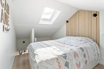 Un ou plusieurs lits dans un hébergement de l'établissement Loft des bords de Loire, idéal voyage d'affaires & Week end