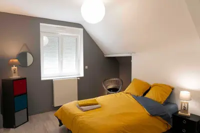 Un ou plusieurs lits dans un hébergement de l'établissement Gîte Le Berceau du Marin 4 chambres terrasse & spa Redon centre 300m