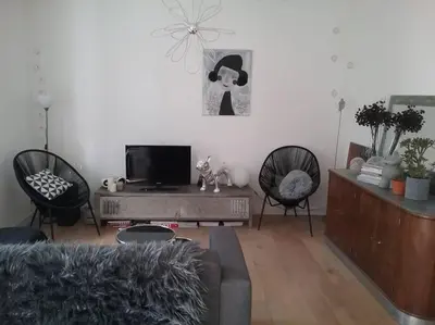 Coin salon dans l'établissement Maison avec jardin- Cholet - 20 mn du puy du fou