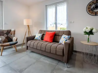 Coin salon dans l'établissement Holiday Home La Villa Dorée by Interhome