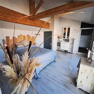 Coin salon dans l'établissement A seulement 150m plage et rue piétonne, maison 90m2, 6 personnes avec parking privé et 2 terrasses sud