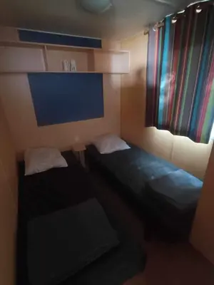 Un ou plusieurs lits dans un hébergement de l'établissement Camping Tohapi Coeur de Vendée