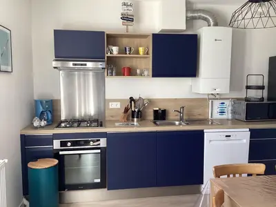 Cuisine ou kitchenette dans l'établissement Ker LN