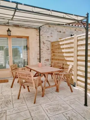 Balcon ou terrasse dans l'établissement Maisonnette Familiale proche du PUYDUFOU