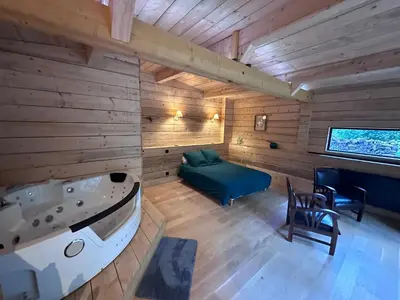Coin salon dans l'établissement Le Chalet