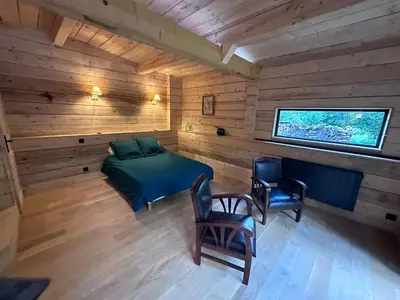 Coin salon dans l'établissement Le Chalet